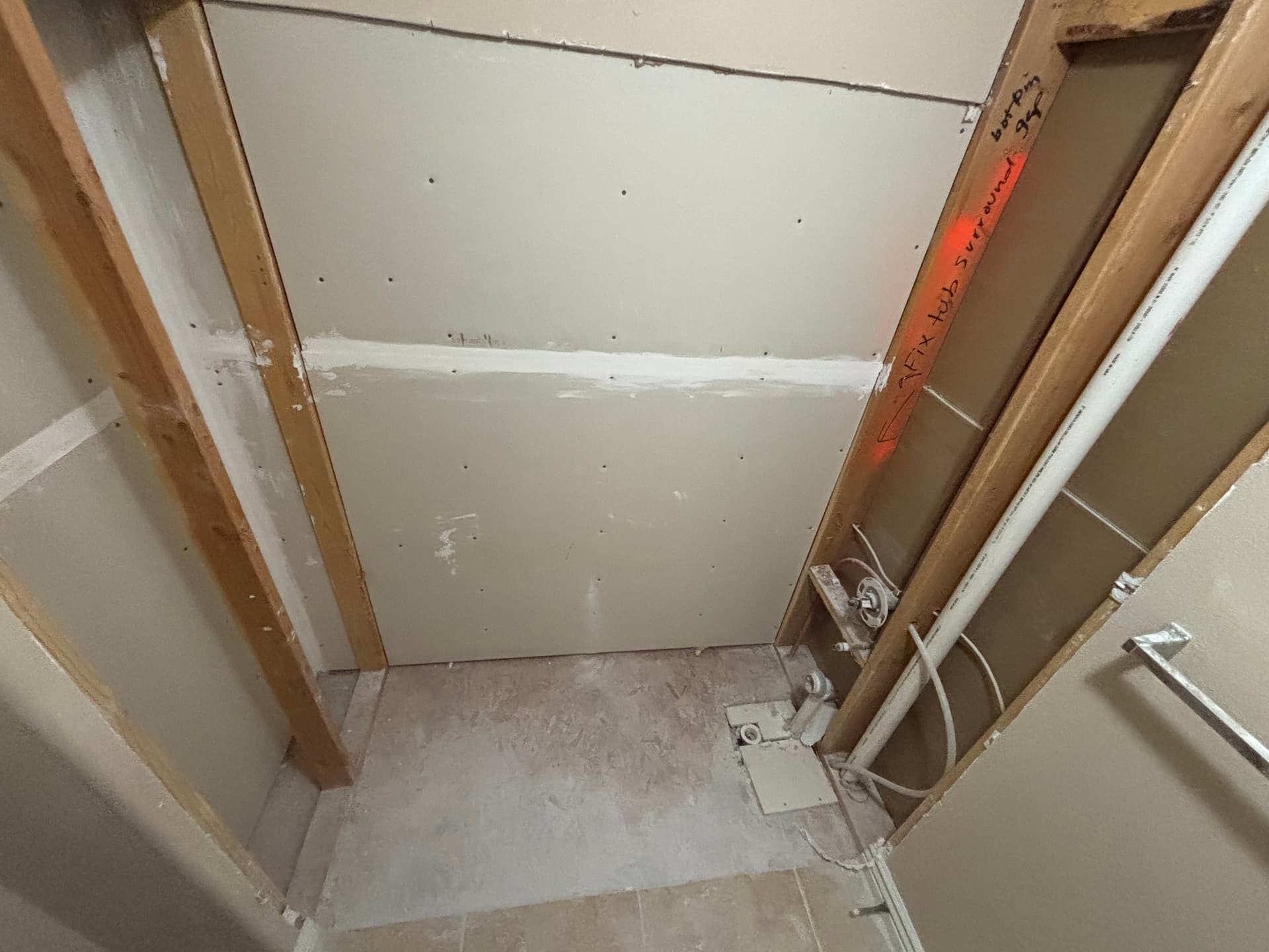 Open Walls to a Finished Shower with a Moen Valve Upgrade image