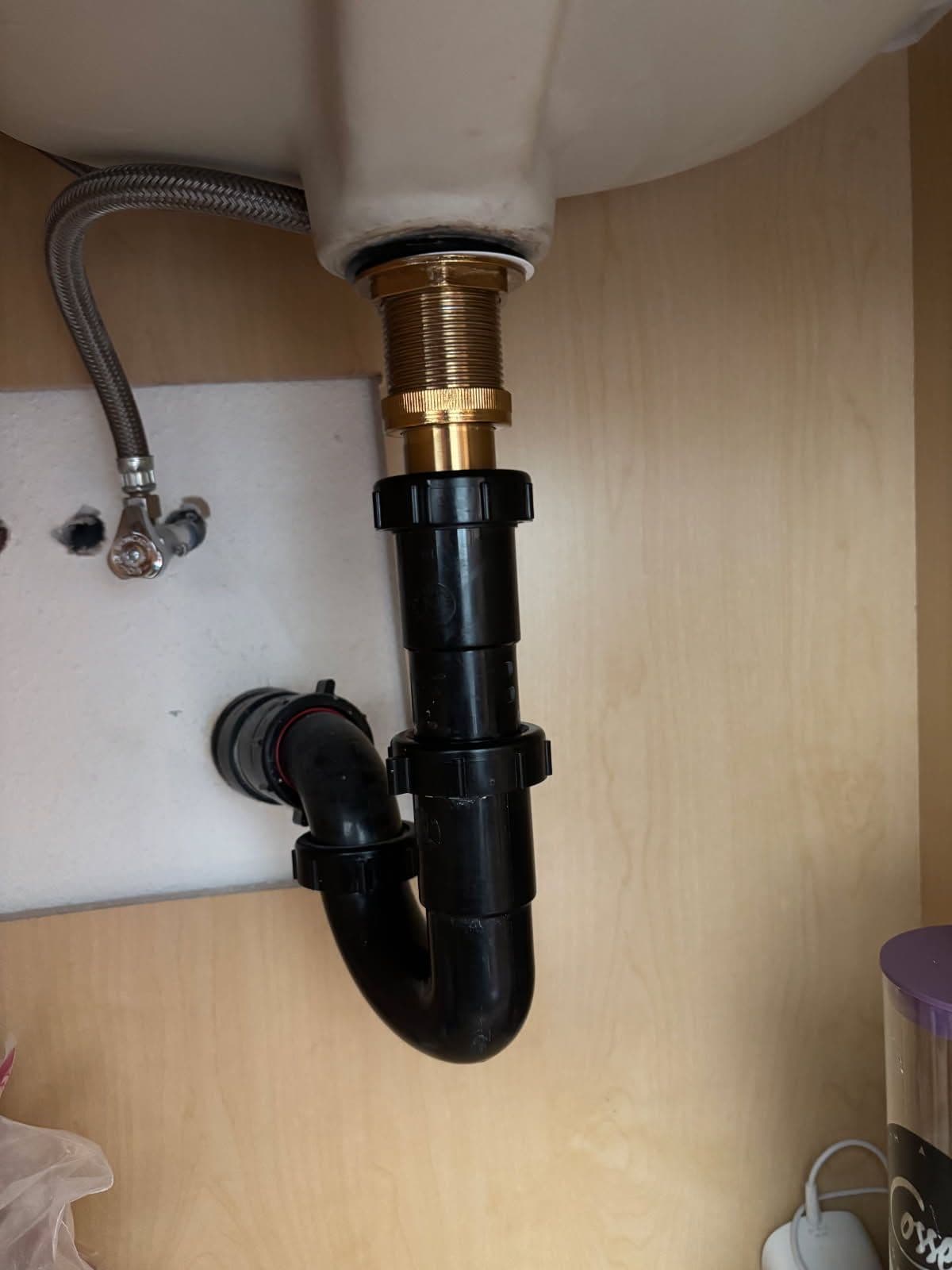 Project Leaking P-Trap Replacement Stops Cabinet Water Damage image
