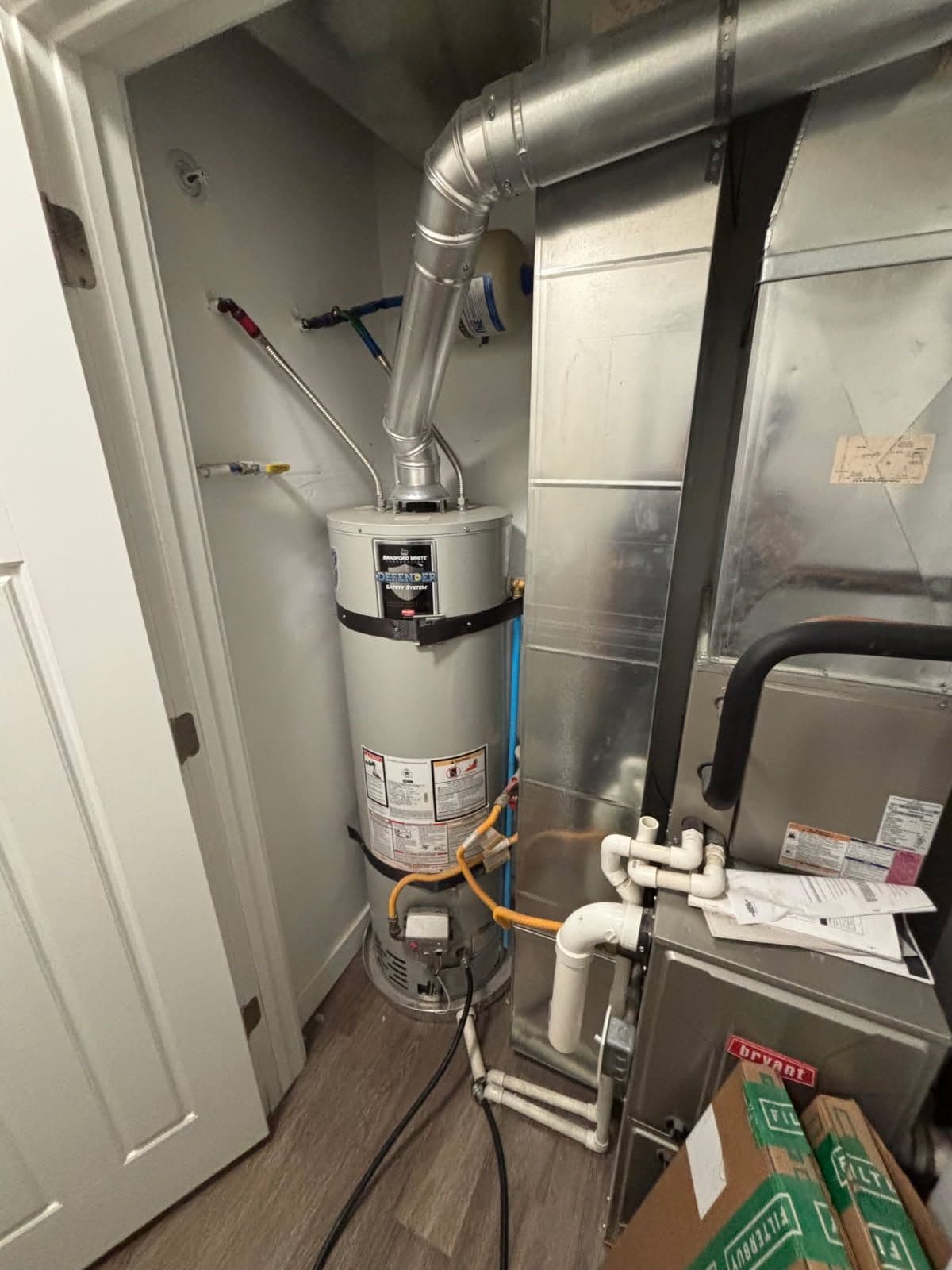 Gallery photos for Leaking Bradford White Replaced with a New Rheem Water Heater: Image #1